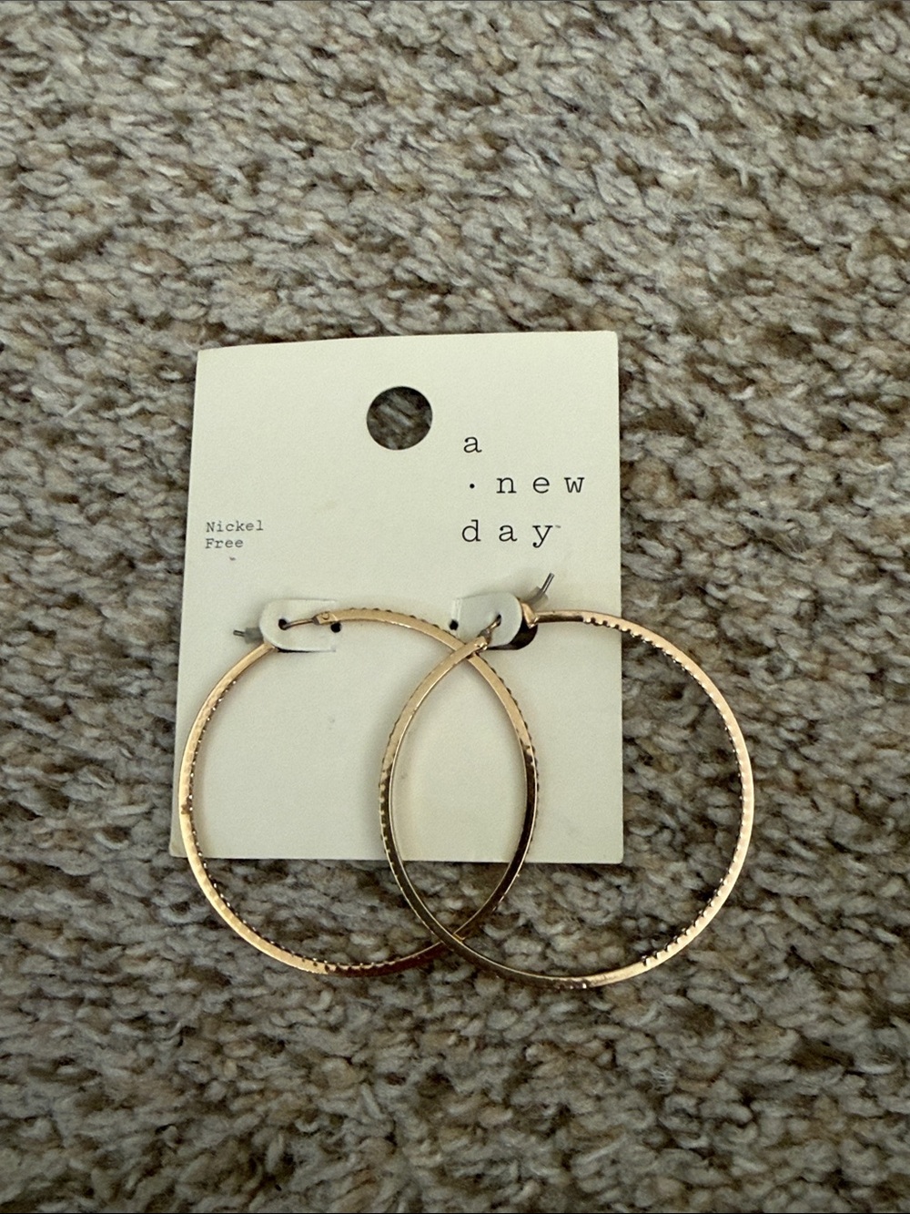 a new day Shiny Gold Hoop Earrings with Subtle Texture